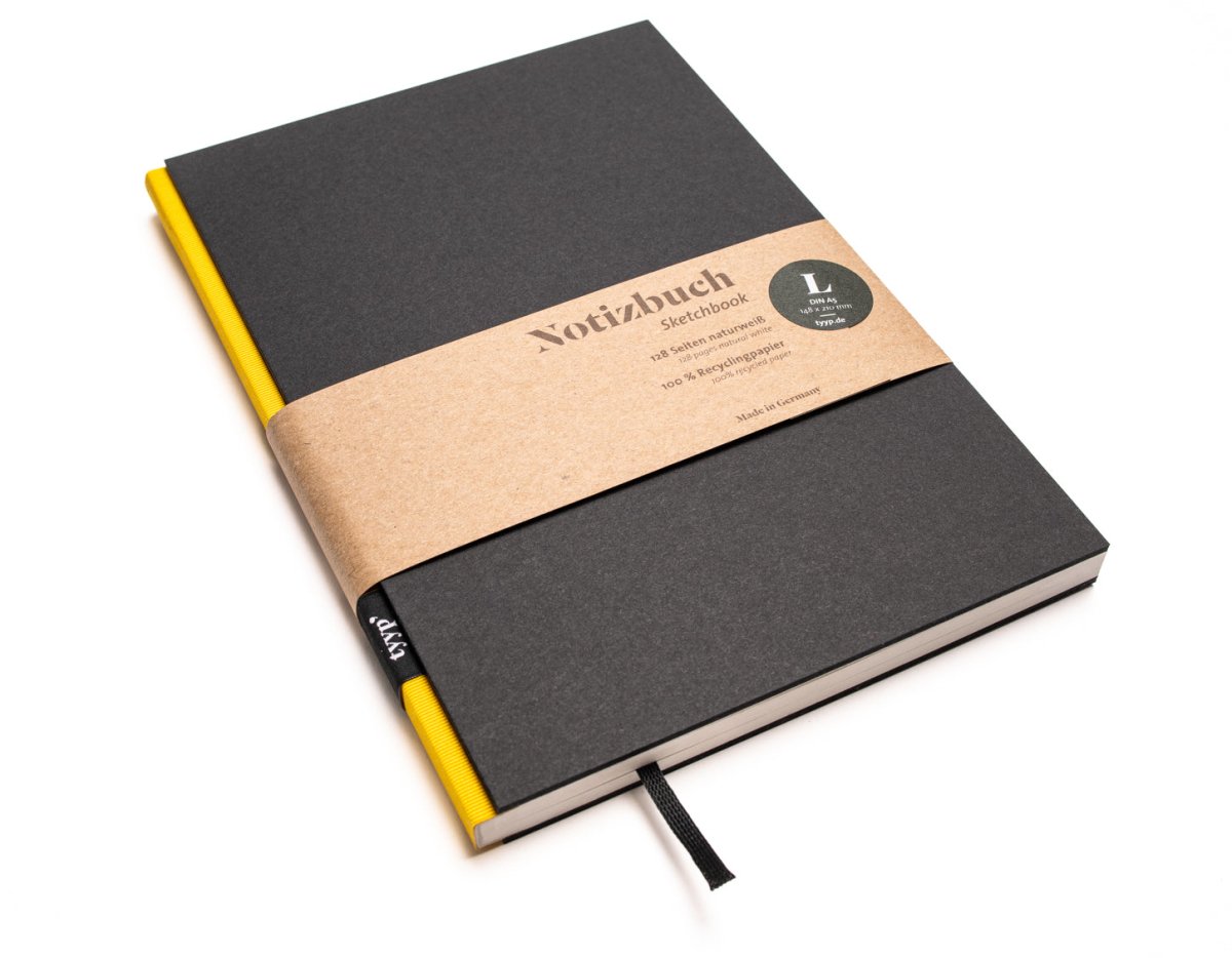 Notizbuch A5 „BerlinBook“ blanko, perforiert, Einband Schwarz | Bundfarbe: Gelb