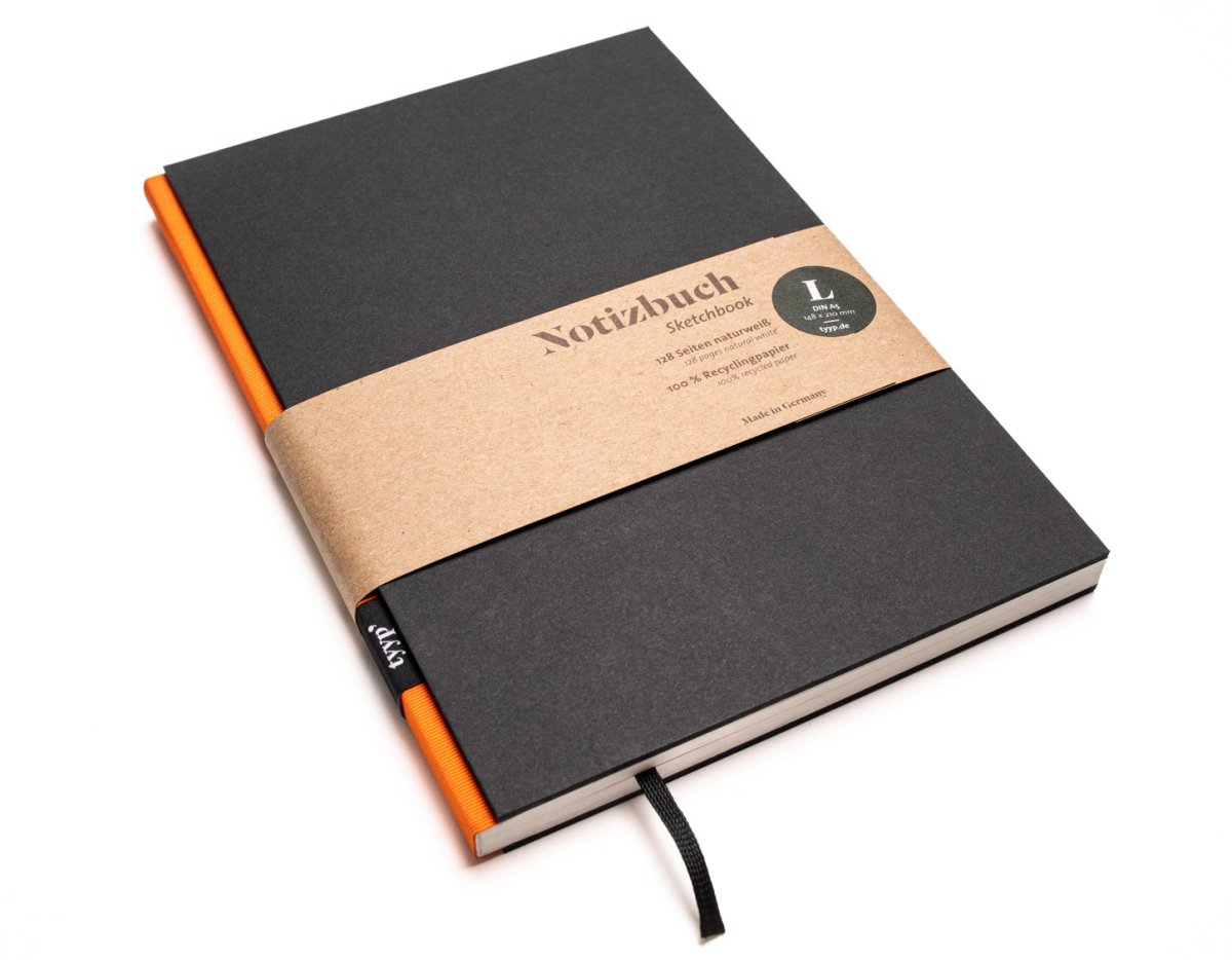 Notizbuch A5 „BerlinBook“ blanko, perforiert, Einband Schwarz | Bundfarbe: Orange