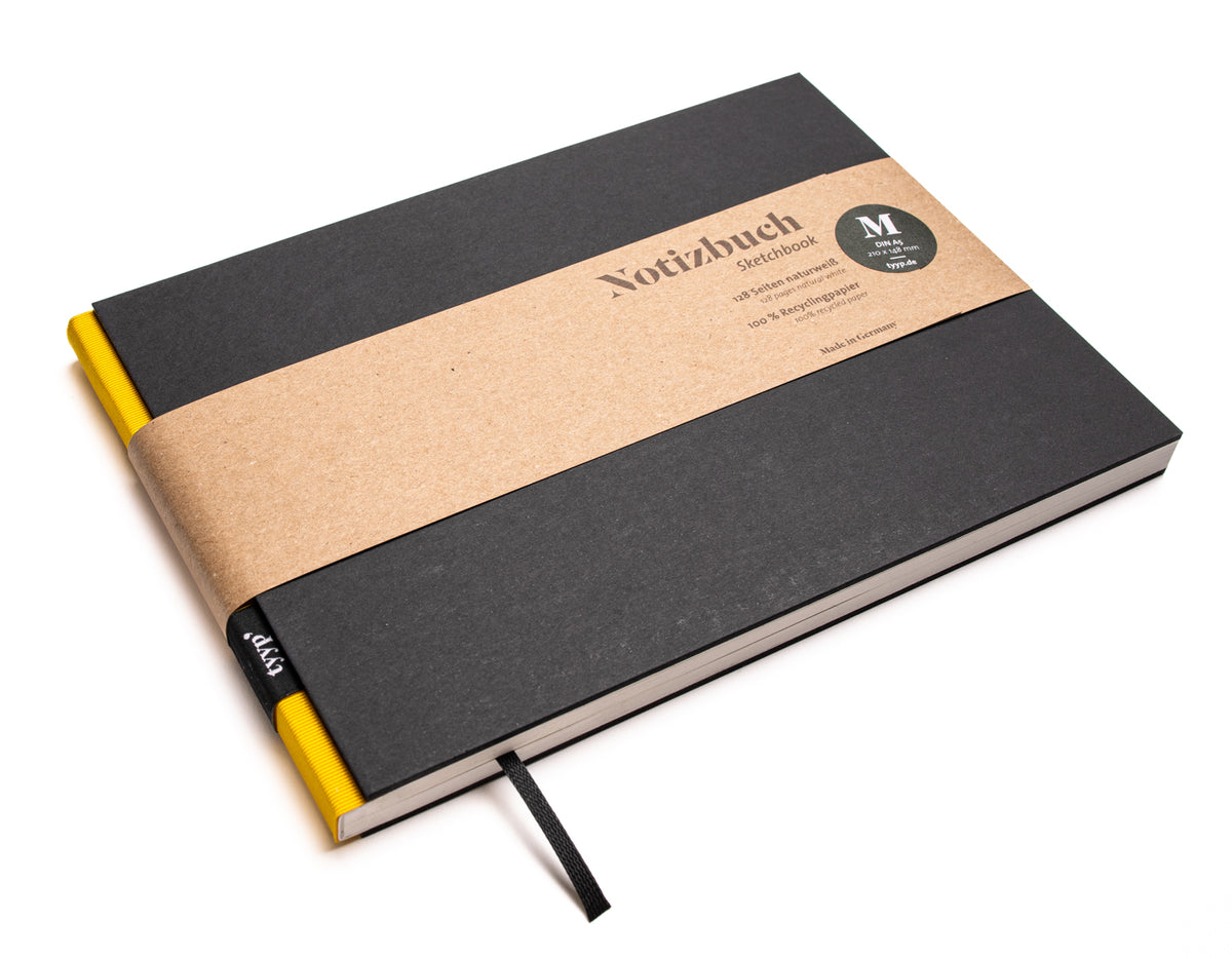 Notizbuch A5 Querformat „BerlinBook“ blanko, perforiert, Einband Schwarz | Bundfarbe: Gelb