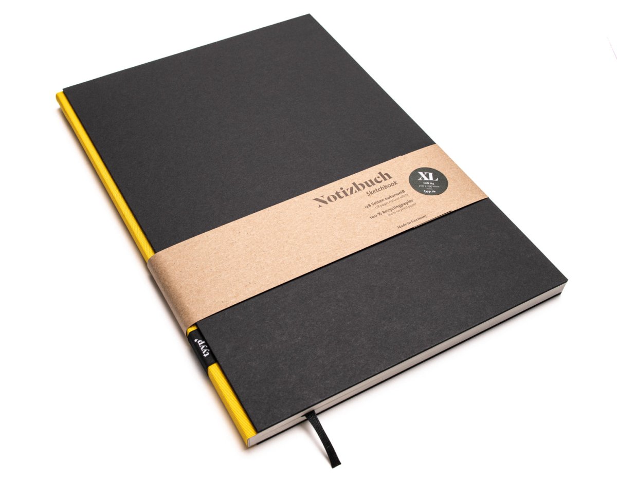 Notizbuch A4 BerlinBook, blanko und perforiert, Einband Schwarz, Bundfarbe Gelb