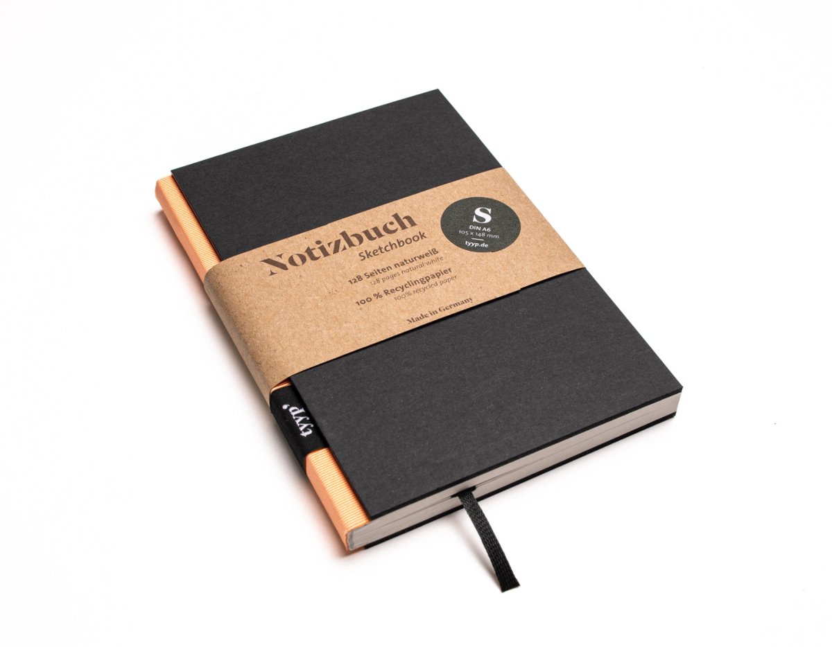 Notizbuch A6 „BerlinBook“ blanko, perforiert, Einband Schwarz | Bundfarbe Lachsfarben