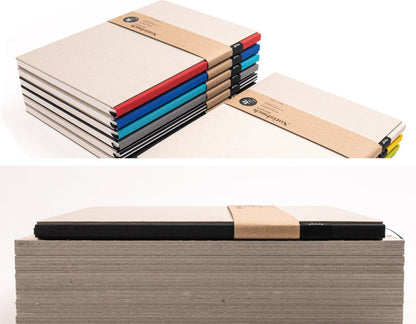 Stapel BerlinBook Notizbücher, A4 Format, blanko und perforiert, verschiedene Bundfarben