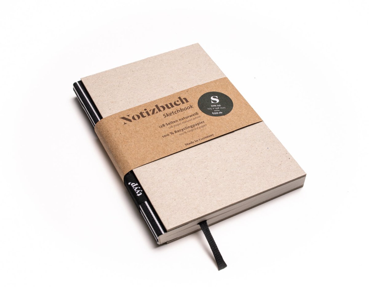 Notizbuch A6 „BerlinBook“ blanko, perforiert, Einband Grau Recyclingkarton | Bundfarbe Schwarz-Streifen