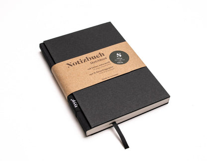 Notizbuch A6 „BerlinBook“ blanko, perforiert, Einband Schwarz | Bundfarbe Lachsfarben