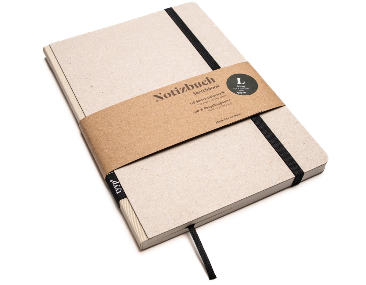 Notizbuch A5 „Klassik“ blanko, perforiert, mit Gummiband, Einband Grau Recyclingkarton  | Bundfarbe: Creme-Farben