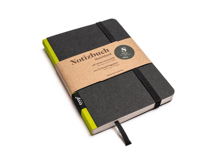 Notizbuch A6 „Klassik“ blanko, Abreißperforation, Einband Schwarz | Bundfarbe: Limetten-Gruen