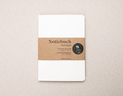 Notizbuch A6 Softcover, blanko Seiten, perforiert, 100% Recyclingpapier, weißes Cover